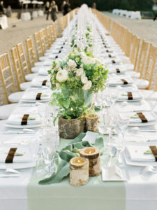 Image Source: AntiqueaholicsImage source: The Bridal ClosetImage Source: getmarried.com PhotoCourtesyof MarthaStewartWeddingsBy Red Letter EventsImage Courtesy: getmarried.com Or what about a mix of BOTH long and rounds tables!? Image source: Elizabeth Anne Designs At any rate Long tables can be beautiful and with the money you saved from not renting round tables and linens, you can spend that toward more elaborate things like lighting and chandeliers which really help to create ambiance at a reception venue.